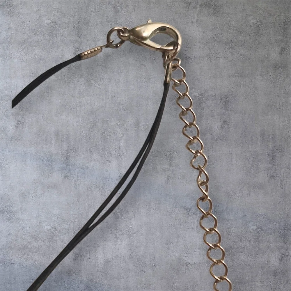 Gold Silver Black and Blur Necklace with Striking Pendant